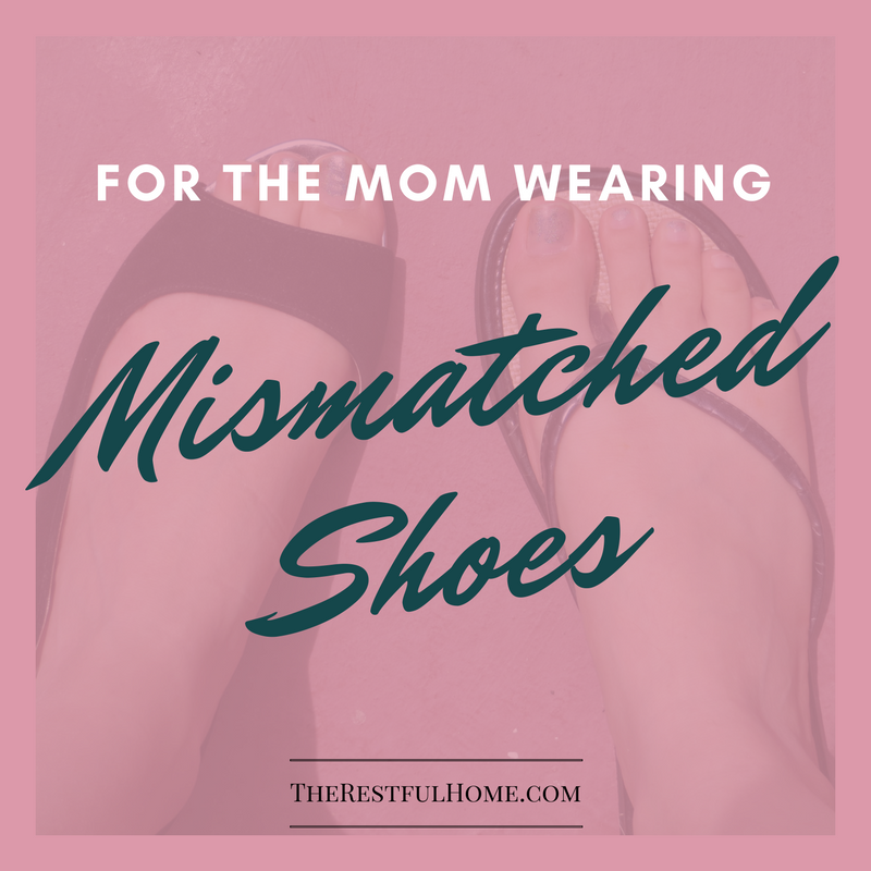 mom wearing mismatched shoes